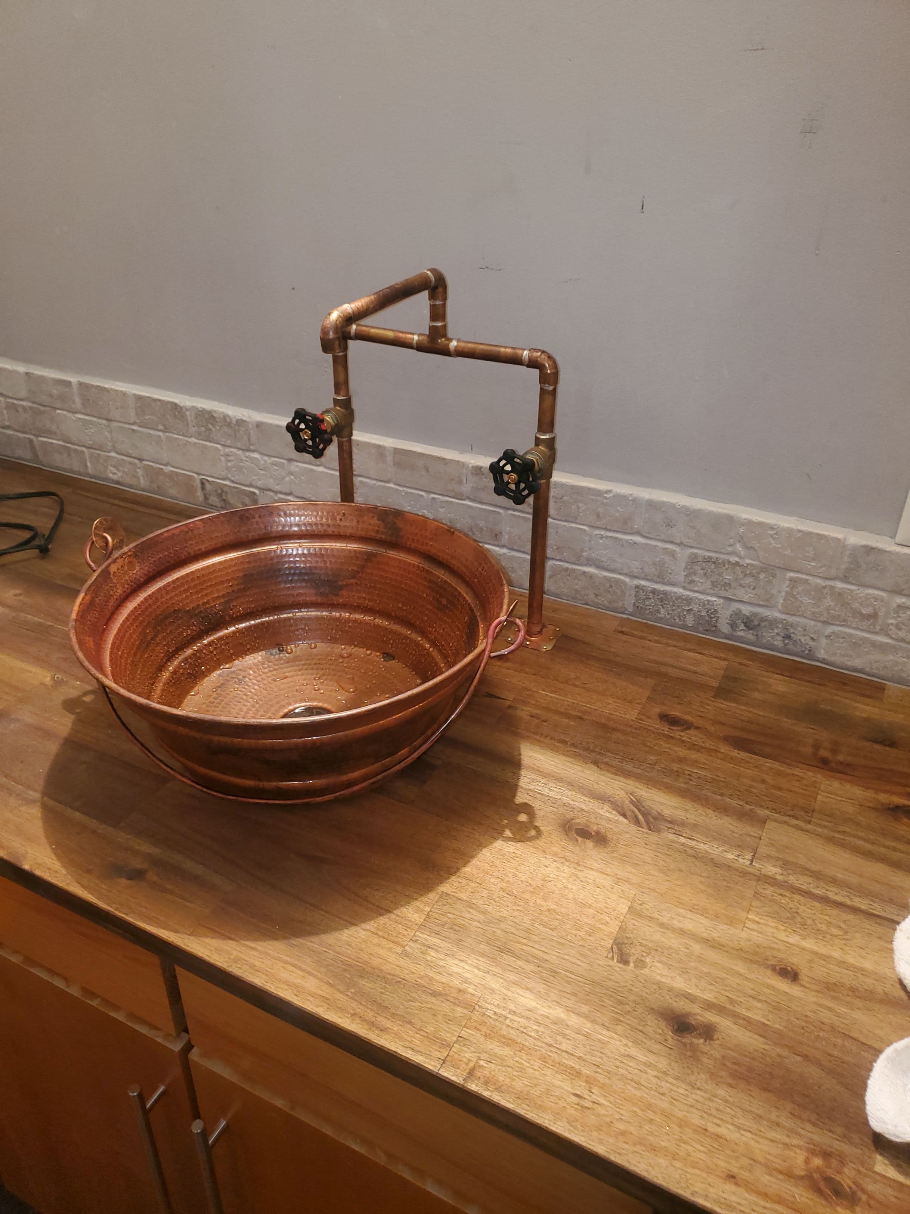 Project Elevate Your Home with Custom Copper Faucet and Basin image
