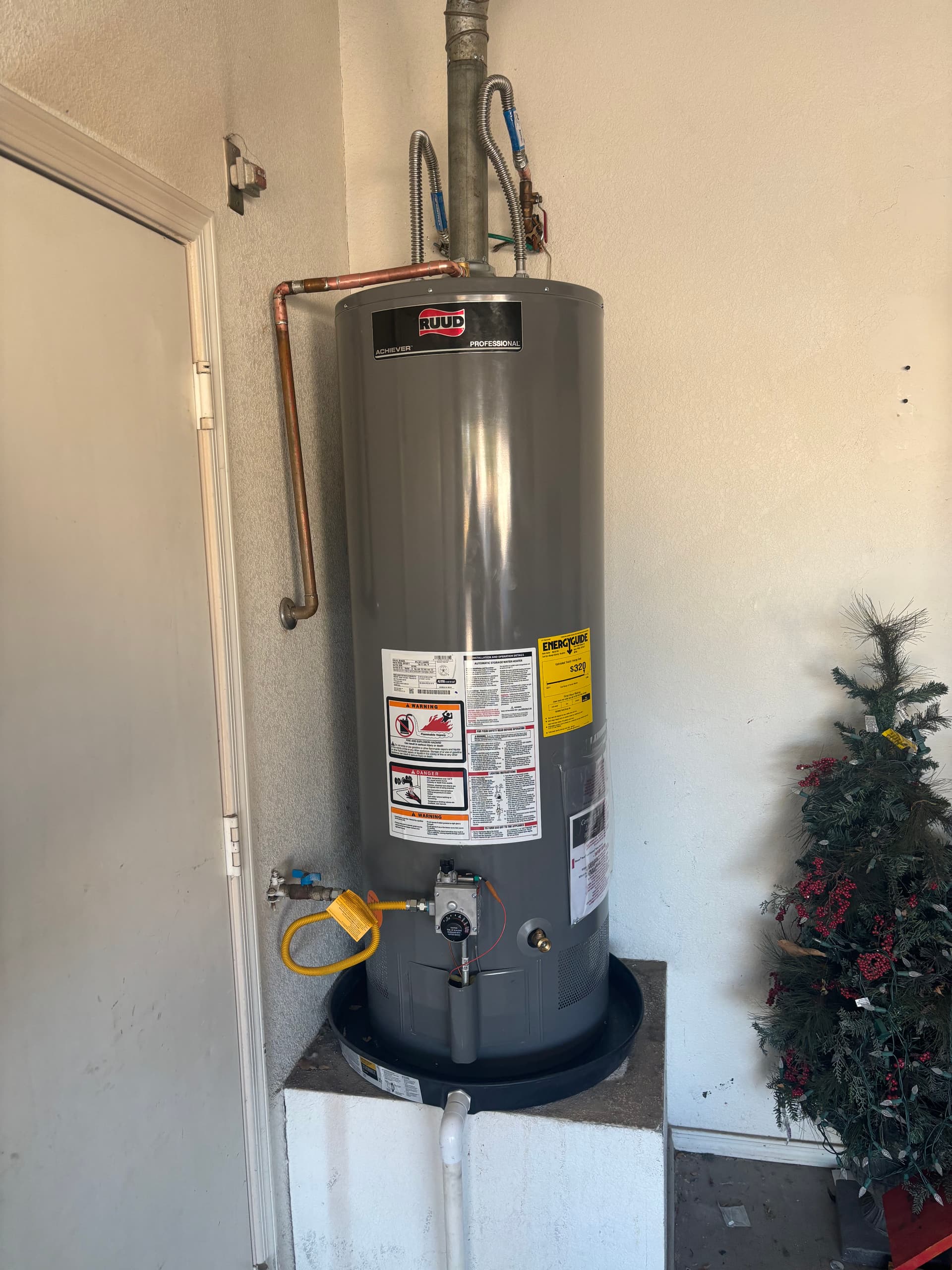 Reliable RUUD Water Heater Replacement for a Cozy Home